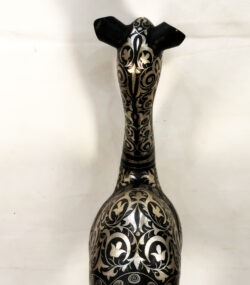 Handmade Moroccan Damascene camel sculpture featuring intricate silver inlay, handcrafted by master artisans in Meknes. Luxury artisan home décor and collectible metal artwork.
