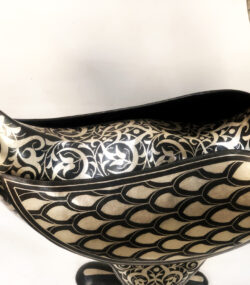Handmade Moroccan Damascene crane sculpture featuring intricate silver inlay, crafted by master artisans in Meknes. Luxury artisan home décor and collectible metal bird artwork.
