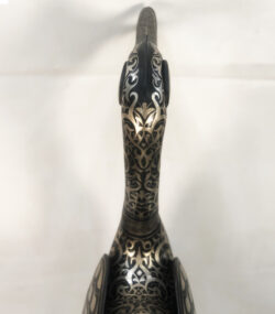 Handmade Moroccan Damascene crane sculpture featuring intricate silver inlay, crafted by master artisans in Meknes. Luxury artisan home décor and collectible metal bird artwork.