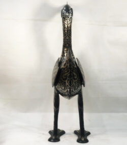 Handmade Moroccan Damascene crane sculpture featuring intricate silver inlay, crafted by master artisans in Meknes. Luxury artisan home décor and collectible metal bird artwork.