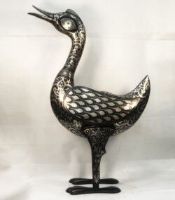 Handmade Moroccan Damascene crane sculpture featuring intricate silver inlay, crafted by master artisans in Meknes. Luxury artisan home décor and collectible metal bird artwork.