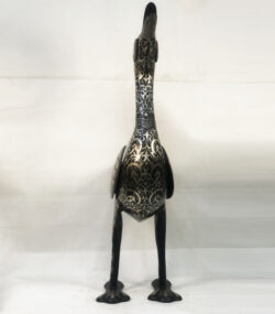 Handmade Moroccan Damascene crane sculpture featuring intricate silver inlay, crafted by master artisans in Meknes. Luxury artisan home décor and collectible metal bird artwork.