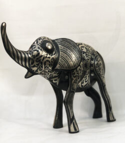 andmade Moroccan Damascene elephant sculpture featuring intricate silver inlay, handcrafted by master artisans in Meknes using traditional Damascene techniques.