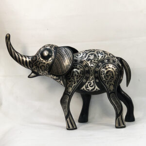 andmade Moroccan Damascene elephant sculpture featuring intricate silver inlay, handcrafted by master artisans in Meknes using traditional Damascene techniques.