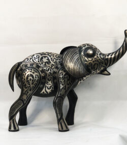 andmade Moroccan Damascene elephant sculpture featuring intricate silver inlay, handcrafted by master artisans in Meknes using traditional Damascene techniques.