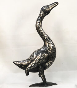 Handmade Moroccan Damascene goose sculpture with intricate silver inlay patterns, handcrafted by master artisans in Meknes, Morocco.