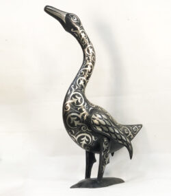Handmade Moroccan Damascene goose sculpture with intricate silver inlay patterns, handcrafted by master artisans in Meknes, Morocco.