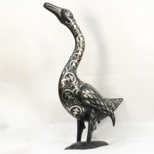 Handmade Moroccan Damascene goose sculpture with intricate silver inlay patterns, handcrafted by master artisans in Meknes, Morocco.