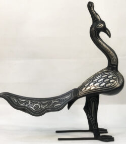 Handmade Moroccan Damascene peacock sculpture featuring traditional silver inlay, handcrafted by master artisans in Meknes. Luxury artisan bird decor
