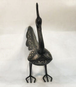 Handmade Moroccan Damascene peacock sculpture featuring traditional silver inlay, handcrafted by master artisans in Meknes. Luxury artisan bird decor