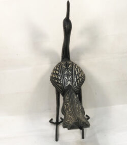 Handmade Moroccan Damascene peacock sculpture featuring traditional silver inlay, handcrafted by master artisans in Meknes. Luxury artisan bird decor