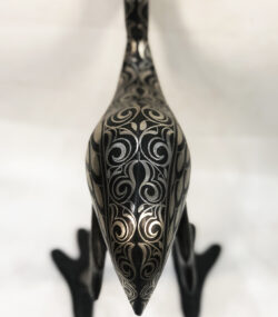 Handmade Moroccan Damascene ostrich sculpture with intricate silver inlay patterns, handcrafted by master artisans in Meknes, Morocco.