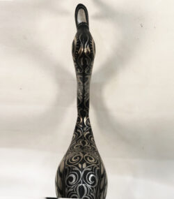 Handmade Moroccan Damascene ostrich sculpture with intricate silver inlay patterns, handcrafted by master artisans in Meknes, Morocco.