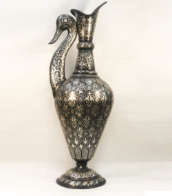 Handmade Moroccan swan pitcher featuring intricate silver hand engravings on black metal, artisan decorative vase for luxury home decor