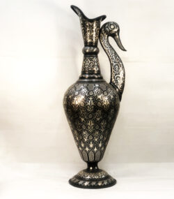 Handmade Moroccan swan pitcher featuring intricate silver hand engravings on black metal, artisan decorative vase for luxury home decor
