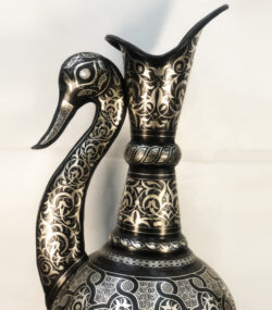 Handmade Moroccan swan pitcher featuring intricate silver hand engravings on black metal, artisan decorative vase for luxury home decor