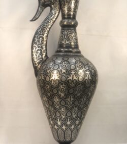 Handmade Moroccan swan pitcher featuring intricate silver hand engravings on black metal, artisan decorative vase for luxury home decor