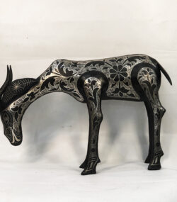 Handmade Moroccan Damascene gazelle sculpture featuring intricate silver inlay, crafted by master artisans in Meknes using traditional Damascene techniques.