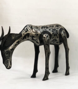 Handmade Moroccan Damascene gazelle sculpture featuring intricate silver inlay, crafted by master artisans in Meknes using traditional Damascene techniques.
