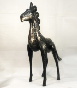 Handmade Moroccan Damascene horse sculpture featuring intricate silver inlay, crafted by master artisans in Meknes. Luxury artisan home décor and collectible metal artwork.