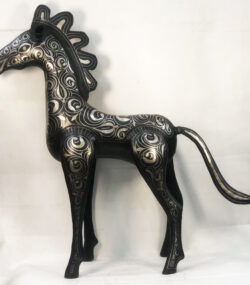 Handmade Moroccan Damascene horse sculpture featuring intricate silver inlay, crafted by master artisans in Meknes. Luxury artisan home décor and collectible metal artwork.