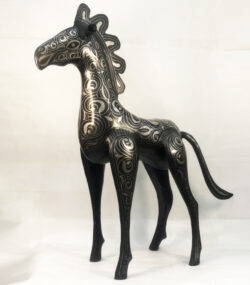 Handmade Moroccan Damascene horse sculpture featuring intricate silver inlay, crafted by master artisans in Meknes. Luxury artisan home décor and collectible metal artwork.