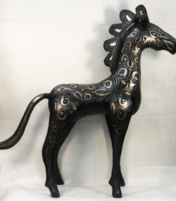 Handmade Moroccan Damascene horse sculpture featuring intricate silver inlay, crafted by master artisans in Meknes. Luxury artisan home décor and collectible metal artwork.
